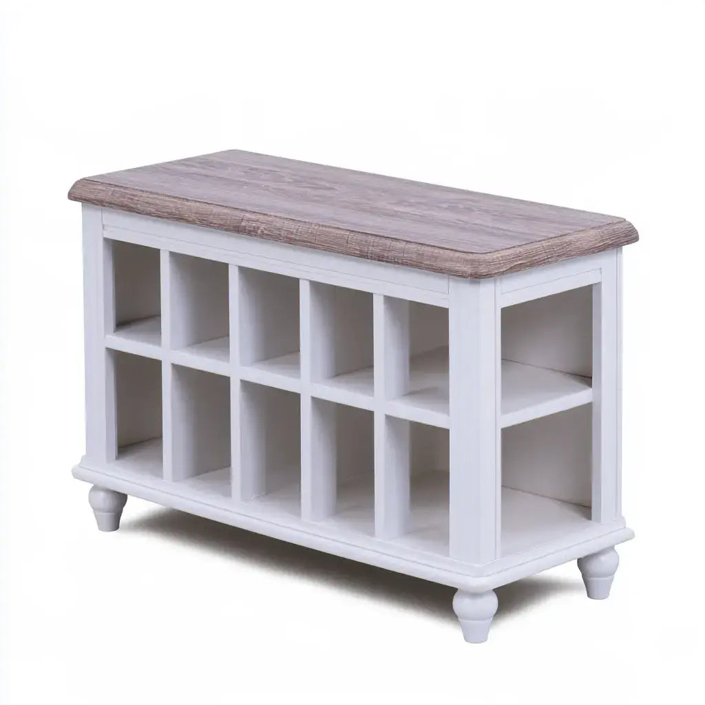Isla de cocina gris con compartimentos abiertos y patas torneadas, mueble funcional para almacenamiento y estilo.
