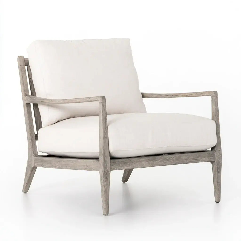 Sillón con estructura abierta y cojines claros - beige